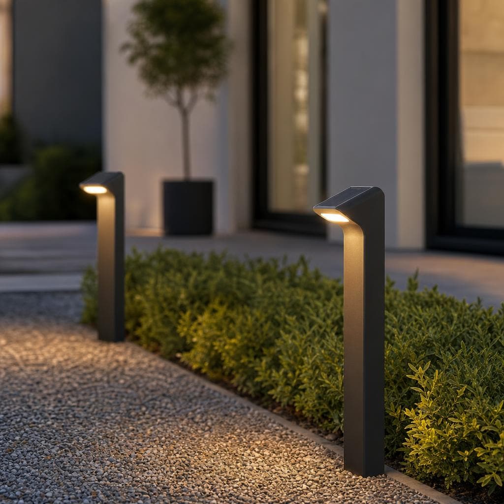 Solar path lights lining a garden path at dusk